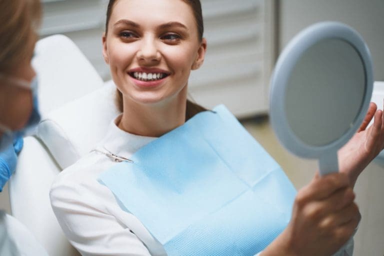 Dental Restorative Procedures | Woman smiling.